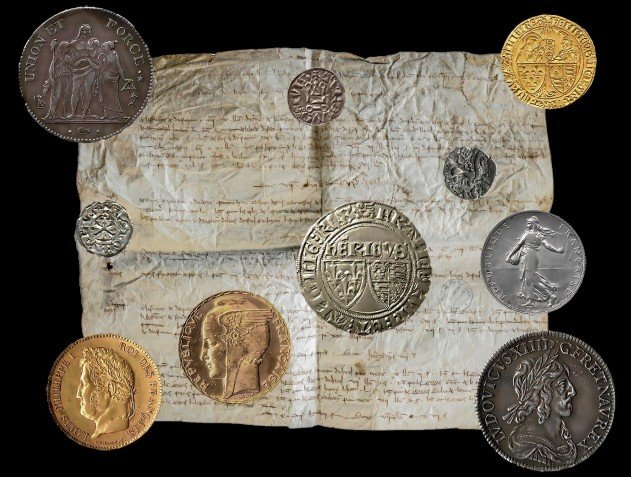 Monnaies anciennes sur un parchemin